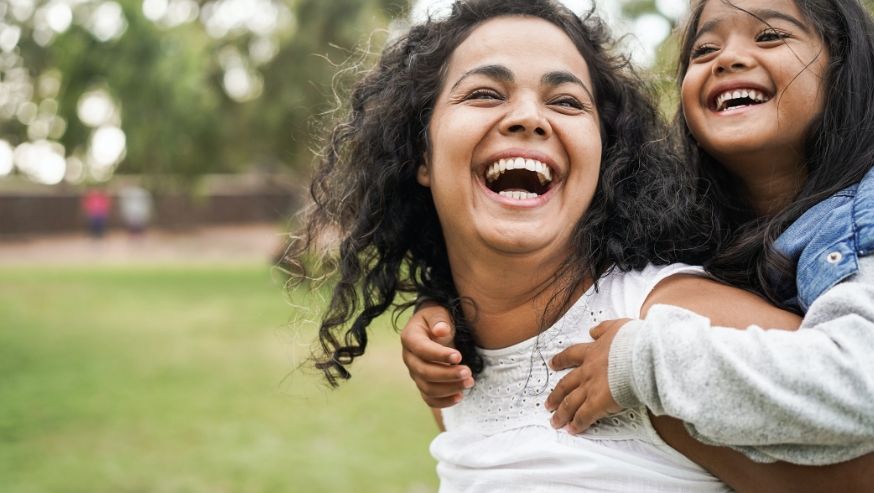 Photo of a mother and daughter in a park